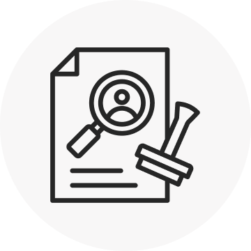 A black and white line art icon showing a document being examined by a magnifying glass that focuses on a human figure, with a rubber stamp lying next to it.