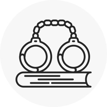 A black and white line art icon showing a pair of handcuffs lying on top of a closed book, symbolizing criminal law, legal consequence, or penal code.